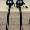 2 Avet 50 Wide 2-Speed Reels & Seeker Rail Boss 2-Piece Bent Butt Rods 1 Two black Avet 50 Wide Seeker Rail Boss 2-piece bent butt rods with Winthrop roller tips