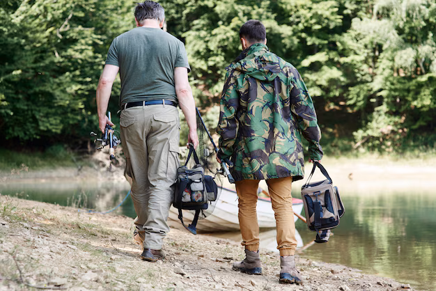 rear view fishermen with fishing tackle 329181 20034